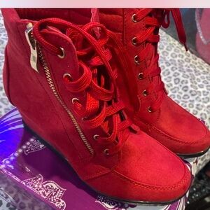 Women's boots, brand new in the box.